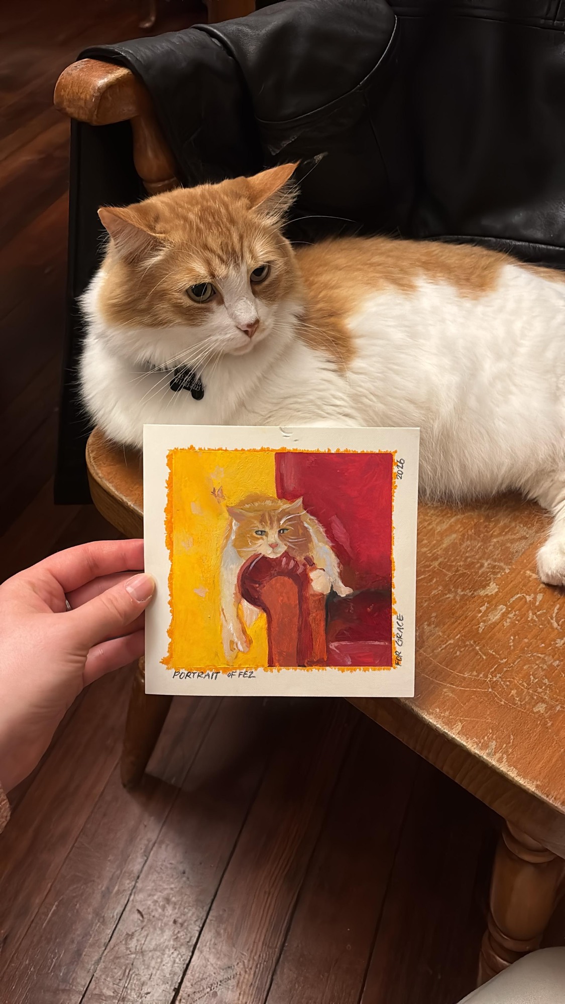 An artist painting a portrait by hand